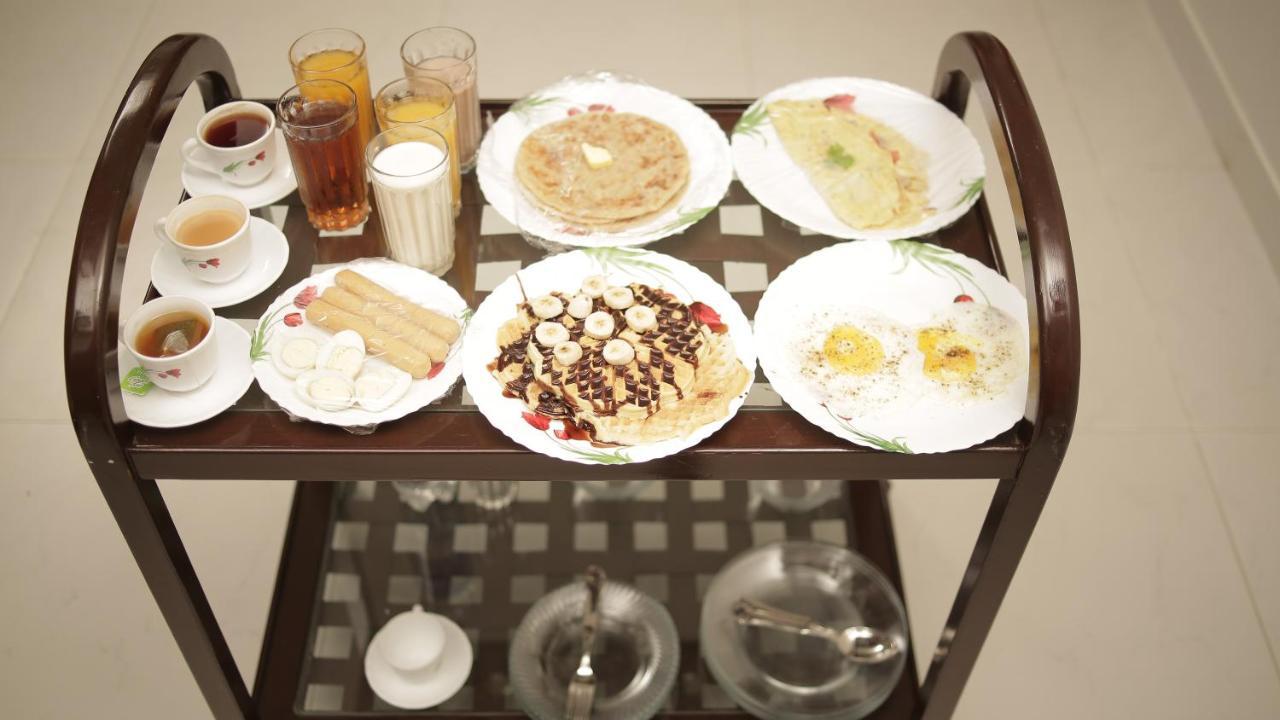 Four Squares Karachi Bed and Breakfast Buitenkant foto